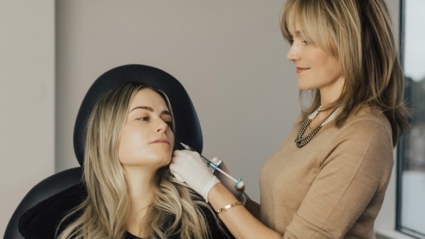 Dr. Shannon Humphrey applying Hyaluronic Acid Gel